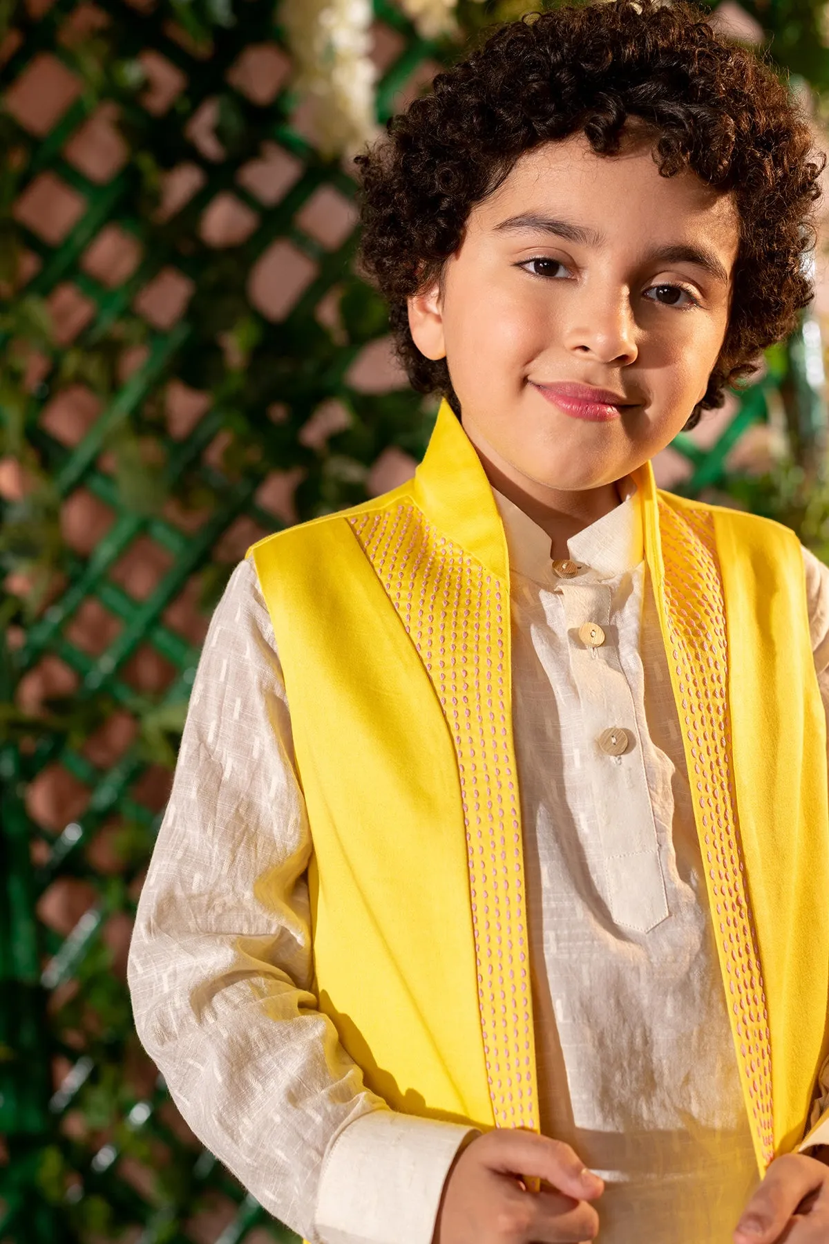 Qanari  -

 Embroidered  

Yellow Nehru Jacket Paired With Cream Kurta & Trouser Set