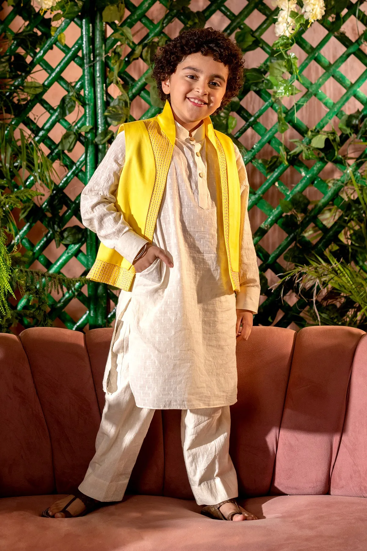 Qanari  -

 Embroidered  

Yellow Nehru Jacket Paired With Cream Kurta & Trouser Set