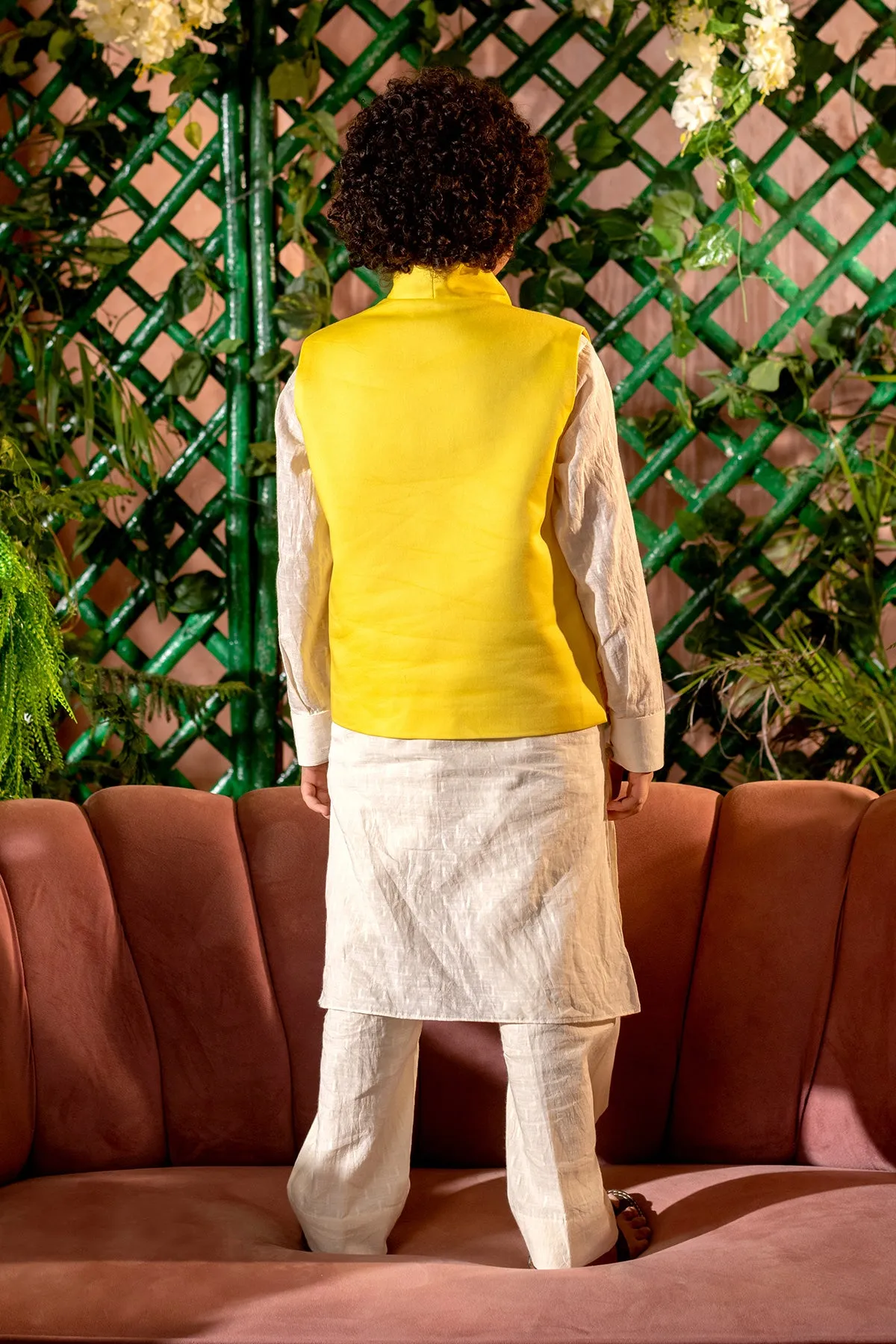 Qanari  -

 Embroidered  

Yellow Nehru Jacket Paired With Cream Kurta & Trouser Set