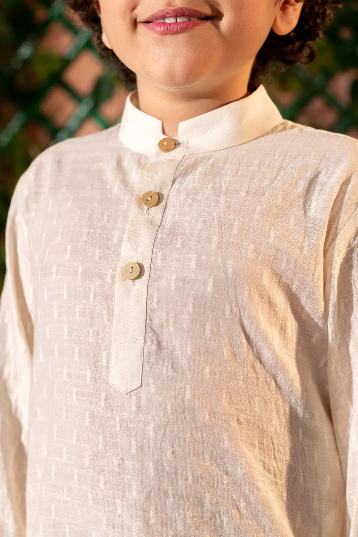 Qanari  -

 Embroidered  

Yellow Nehru Jacket Paired With Cream Kurta & Trouser Set